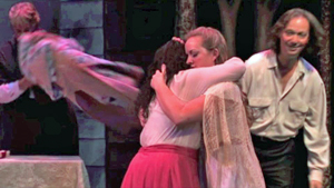 Angelique comforts Marie as the crowd gathers